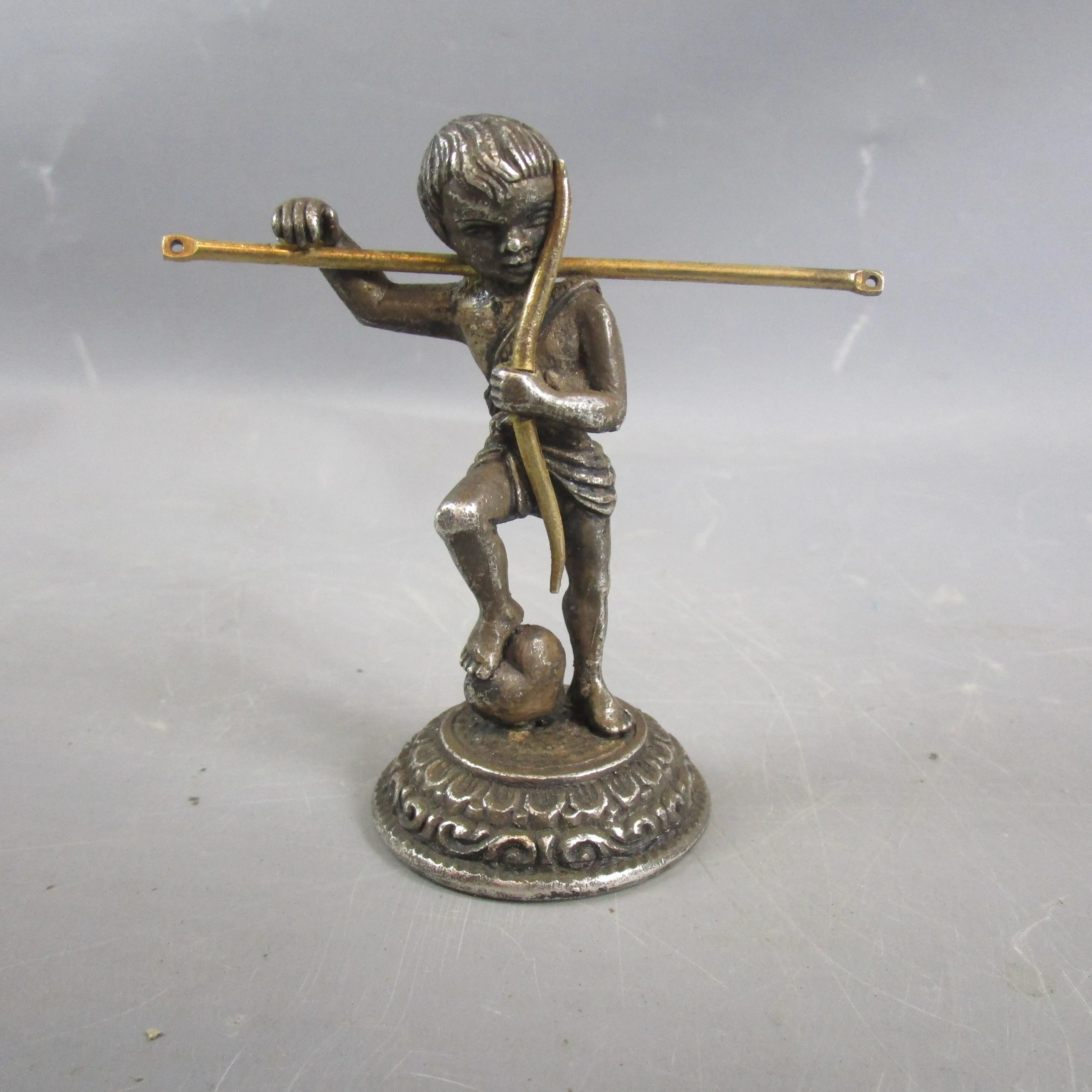 Cast White Metal Cherub Standing On Heart Holding Bow Antique c1880