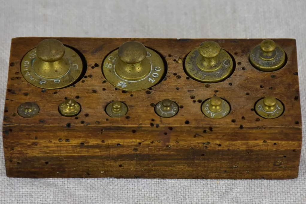 Set of ten antique French weights for scales - 1-200g