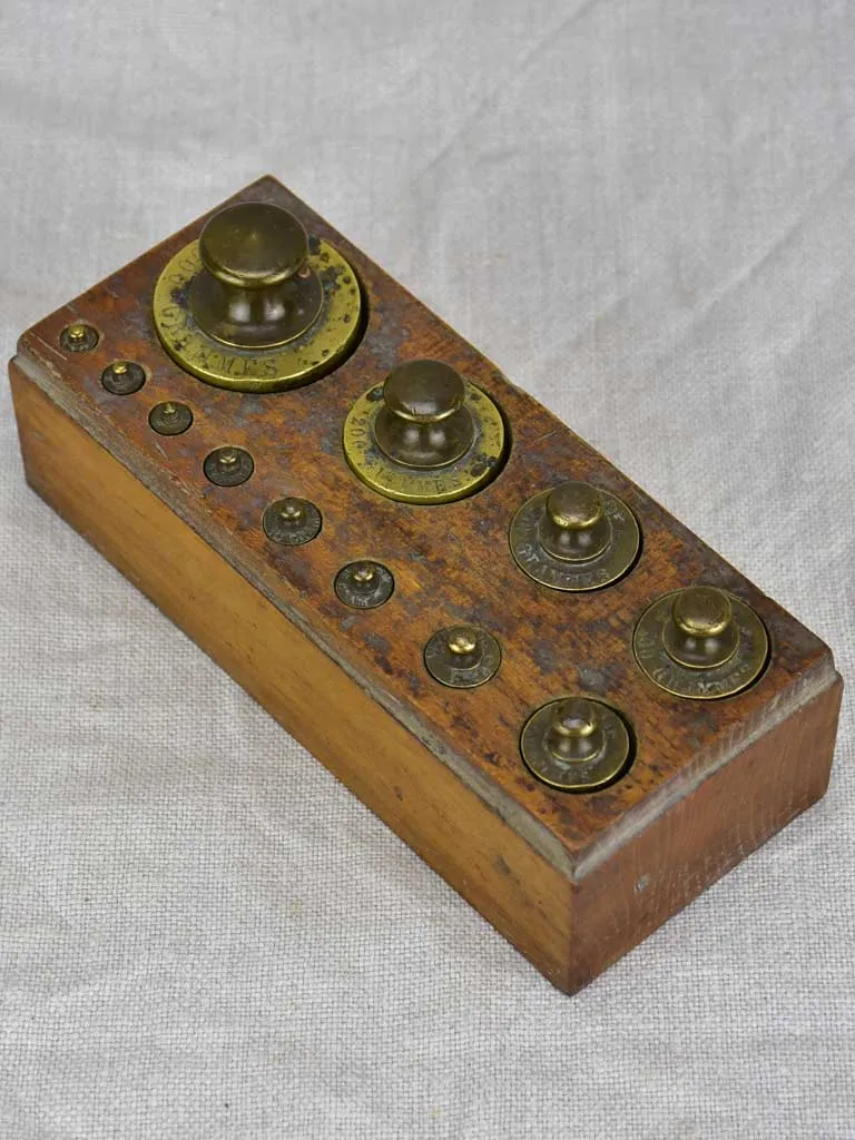 Set of twelve antique French weights for scales - 1-500g