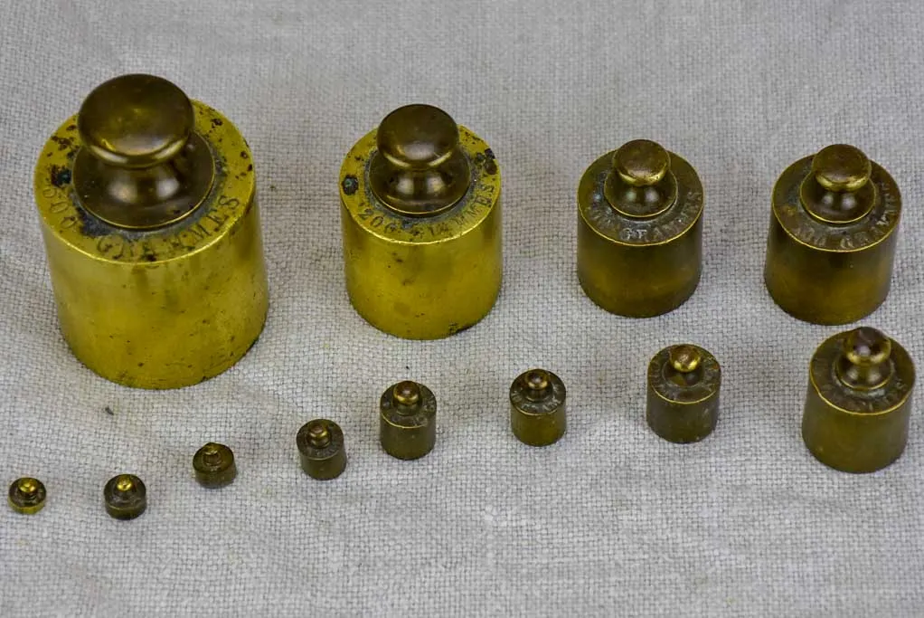 Set of twelve antique French weights for scales - 1-500g