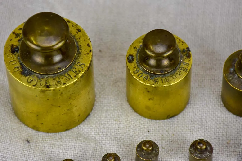Set of twelve antique French weights for scales - 1-500g