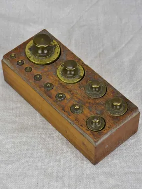 Set of twelve antique French weights for scales - 1-500g