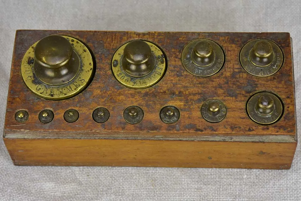 Set of twelve antique French weights for scales - 1-500g